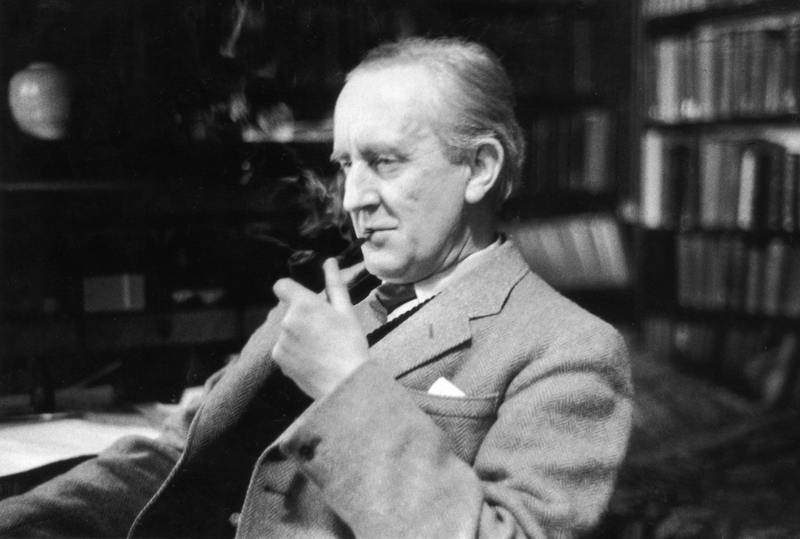 Tolkien enjoying a pipe in his study at Merton College.